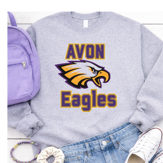 Gray sweatshirt with 'Avon Eagles' logo, purple backpack, white sneakers, and blue jeans on a white background