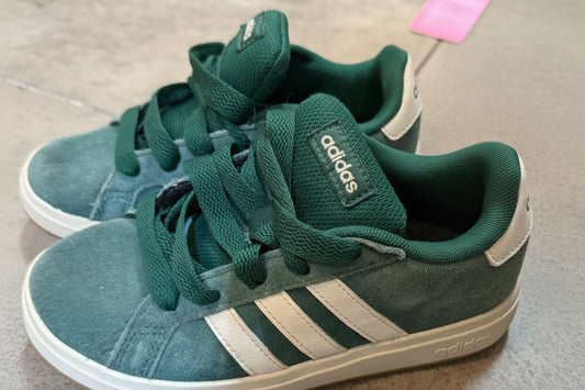 Green Adidas sneakers