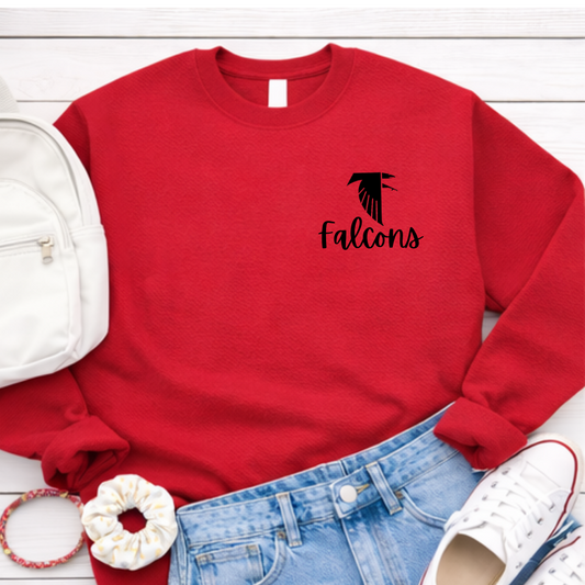 Red sweatshirt with 'Falcons' logo on a white surface with accessories. Fireland Falcons School Spirit Crewneck Sweatshirt