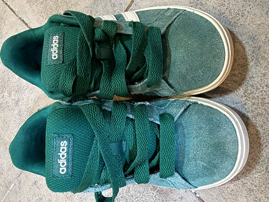 Green Adidas sneakers