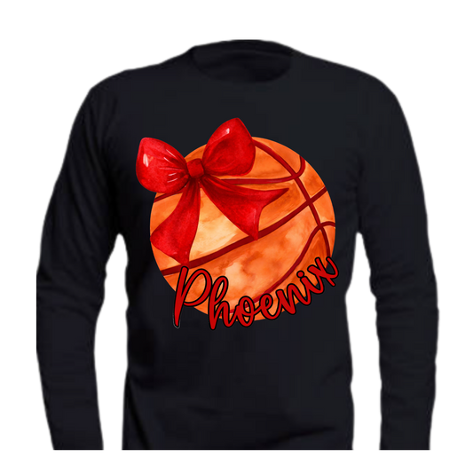 Black long-sleeve shirt with a basketball design featuring a red bow and 'Phoenix' text 