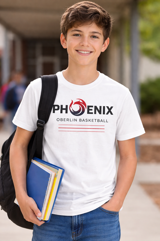 Young boy wearing a white t-shirt with 'Phoenix Oberlin Basketball' design, holding books and a backpack.